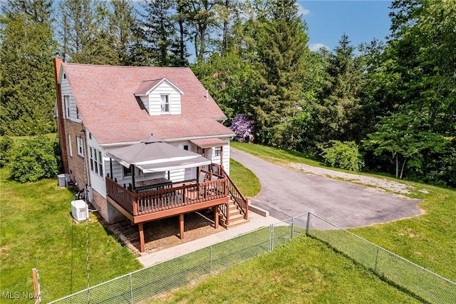 10790 Good Hope Pike, Jane Lew, WV 26378 - rear view of house featuring a wooden deck, central air condition unit, a chimney, and asphalt driveway