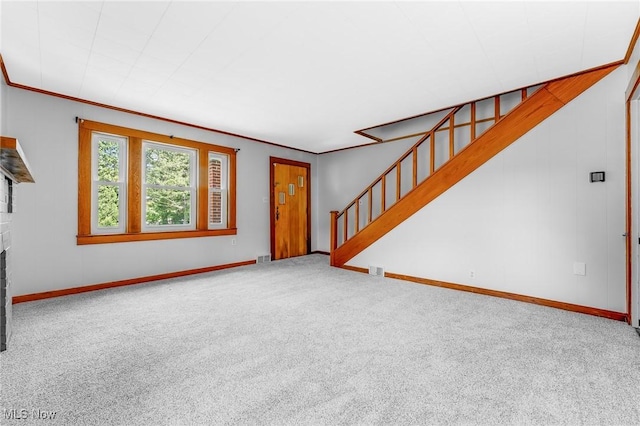 10790 Good Hope Pike, Jane Lew, WV 26378 - unfurnished living room featuring carpet flooring, baseboards, stairs, and ornamental molding