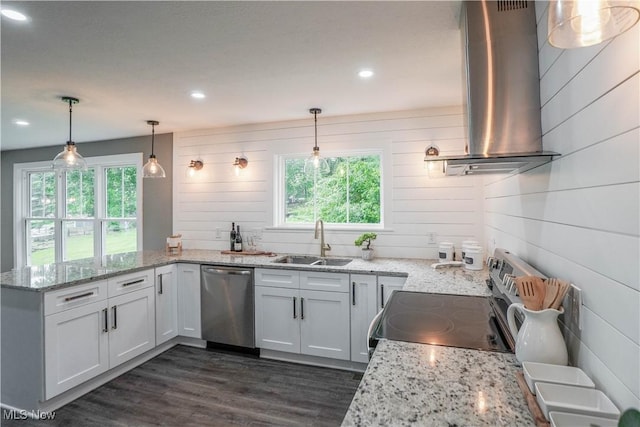 680 Isle View Dr, Akron, OH 44319 - kitchen featuring appliances with stainless steel finishes, a sink, island exhaust hood, a peninsula, and dark wood-style flooring