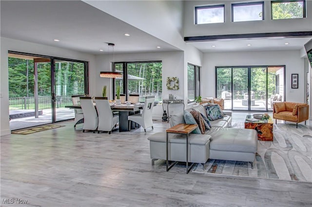4385 Good Rd, Seville, OH 44273 - living area with plenty of natural light, recessed lighting, and wood finished floors