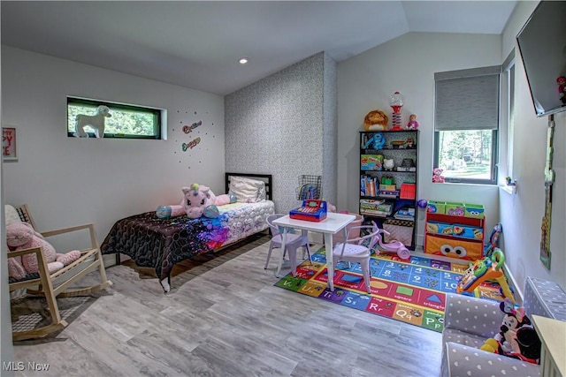 4385 Good Rd, Seville, OH 44273 - bedroom with lofted ceiling and wood finished floors