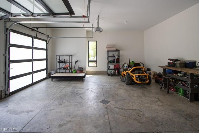 4385 Good Rd, Seville, OH 44273 - garage featuring a garage door opener