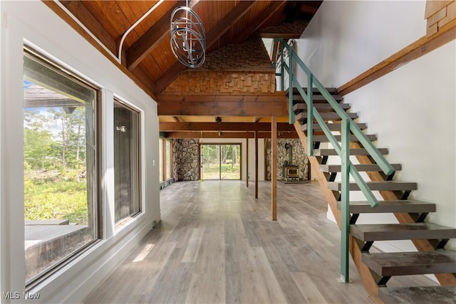 6226 Mayburn Barclay Rd, Kinsman, OH 44428 - stairway with wooden ceiling with exposed beams, plenty of natural light, wood finished floors, and high vaulted ceiling