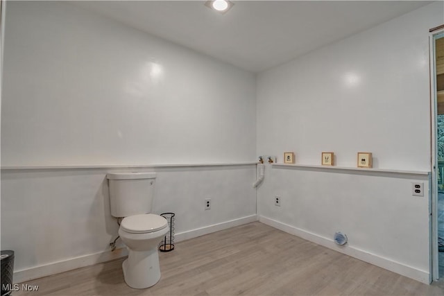 6226 Mayburn Barclay Rd, Kinsman, OH 44428 - bathroom featuring wood finished floors, toilet, and baseboards