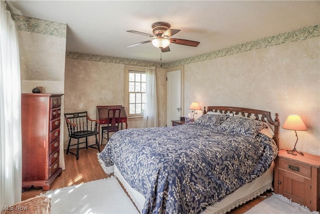 1415 Inwood Rd, Alliance, OH 44601 - bedroom featuring wood finished floors and a ceiling fan