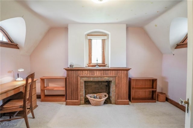 1415 Inwood Rd, Alliance, OH 44601 - carpeted office with vaulted ceiling, healthy amount of natural light, a fireplace, and baseboards