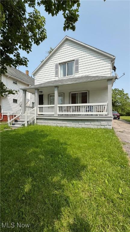 3415 E 114th St, Cleveland, OH 44104 - bungalow with a porch and a front yard