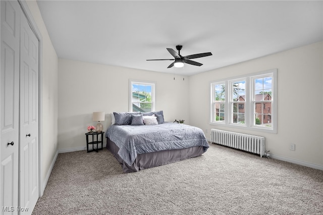 3609 Antisdale Ave, Cleveland Heights, OH 44118 - carpeted bedroom with radiator, baseboards, a closet, and a ceiling fan