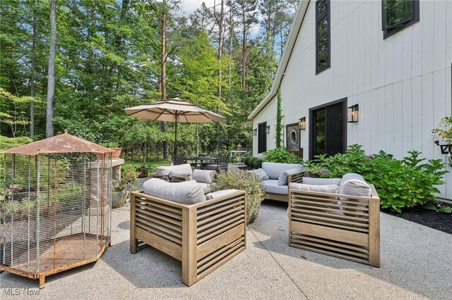 7090 Country Ln, Chagrin Falls, OH 44023 - view of patio / terrace with an outdoor hangout area and view of scattered trees