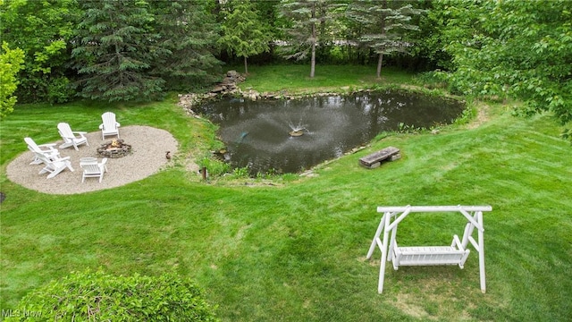 7090 Country Ln, Chagrin Falls, OH 44023 - view of grassy yard featuring a fire pit