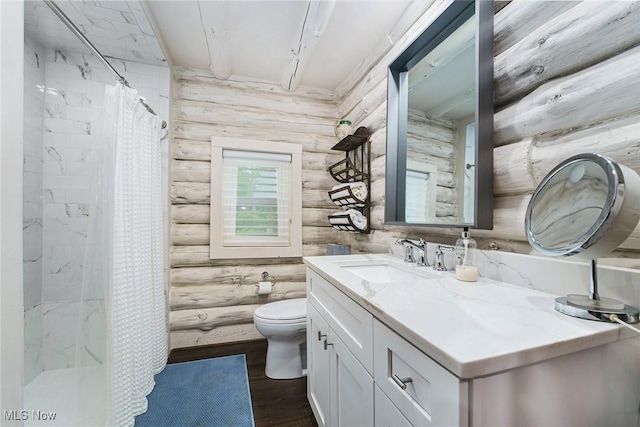 7090 Country Ln, Chagrin Falls, OH 44023 - bathroom with toilet, wood finished floors, log walls, vanity, and a shower with shower curtain