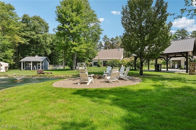 7090 Country Ln, Chagrin Falls, OH 44023 - view of green lawn featuring a gazebo and an outdoor structure