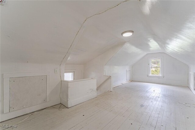 906 Beardsley St, Akron, OH 44311 - additional living space featuring vaulted ceiling and hardwood / wood-style floors