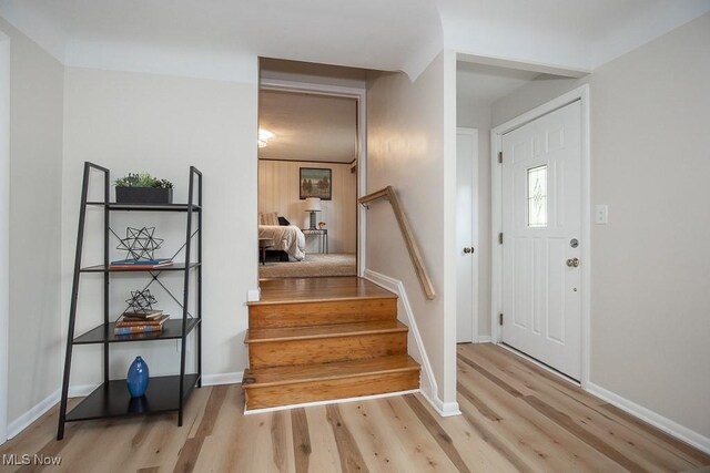 3762 Covington Rd, South Euclid, OH 44121 - entryway with wood finished floors, stairway, and baseboards