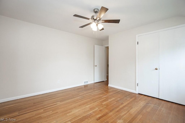 3762 Covington Rd, South Euclid, OH 44121 - unfurnished bedroom featuring light wood-style flooring, baseboards, a ceiling fan, and a closet