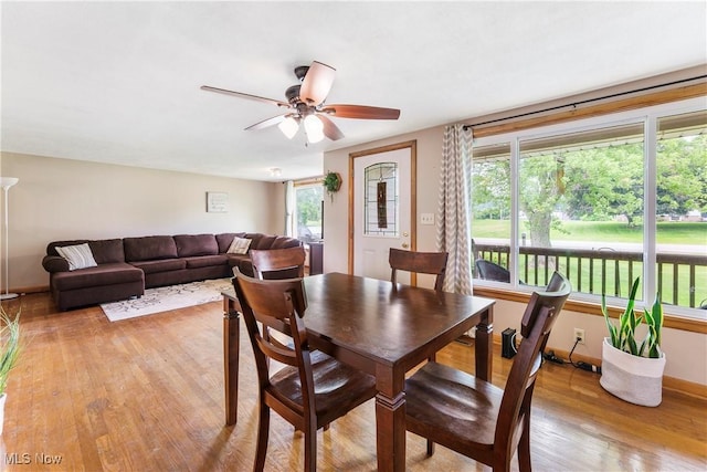 22938 US Route 30, Minerva, OH 44657 - dining room featuring light wood-style floors and a ceiling fan