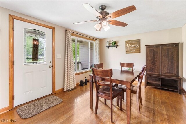22938 US Route 30, Minerva, OH 44657 - dining room with light wood finished floors, ceiling fan, and baseboards