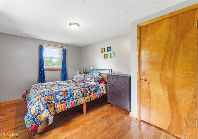 22938 US Route 30, Minerva, OH 44657 - bedroom with wood finished floors and baseboards