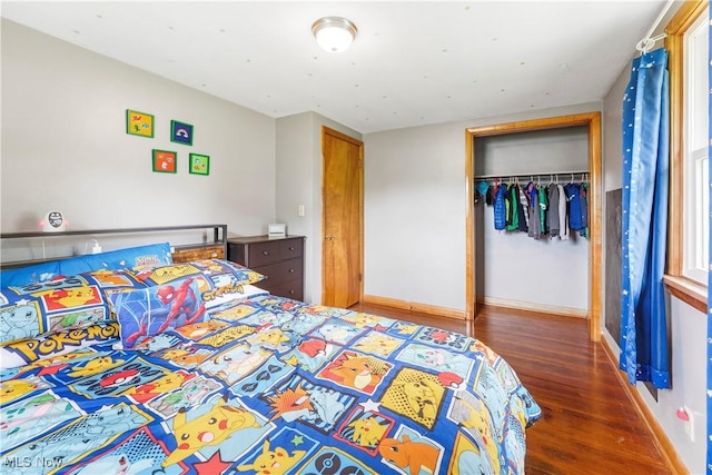 22938 US Route 30, Minerva, OH 44657 - bedroom with wood finished floors, baseboards, and a closet