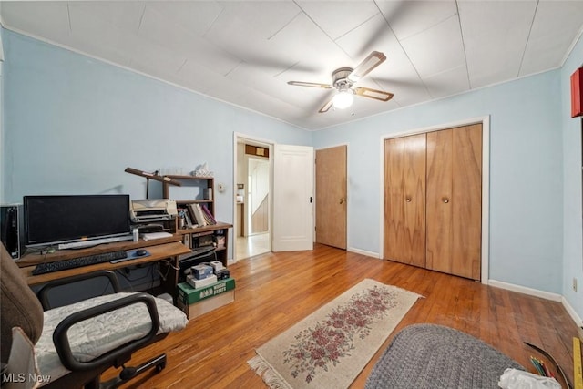 7100 Barton Rd, North Olmsted, OH 44070 - office space with a ceiling fan, wood-type flooring, and baseboards