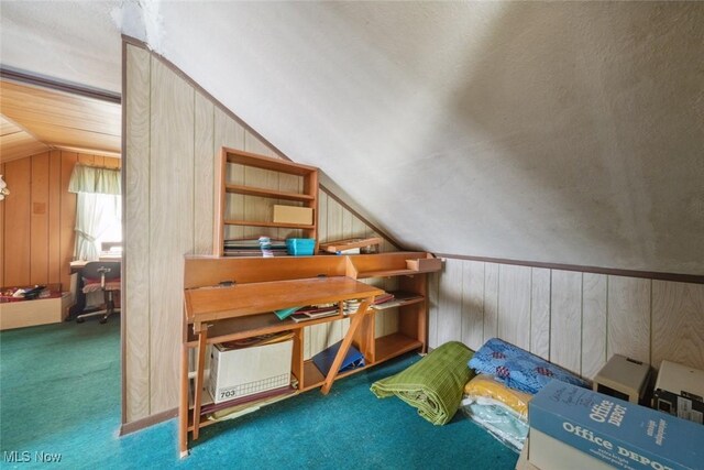 7100 Barton Rd, North Olmsted, OH 44070 - bonus room with lofted ceiling, wooden walls, and carpet flooring