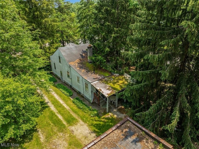 7100 Barton Rd, North Olmsted, OH 44070 - view of subject property featuring a heavily wooded area