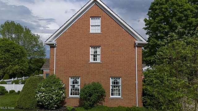 195 W 5th St, Zoar, OH 44622 - view of home's exterior with brick siding