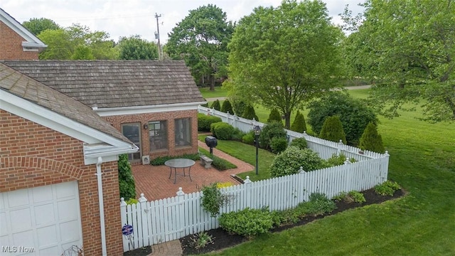 195 W 5th St, Zoar, OH 44622 - view of yard with an attached garage