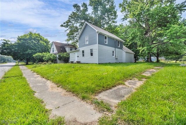 225 E Bergey St, Wadsworth, OH 44281 - view of property exterior featuring a lawn