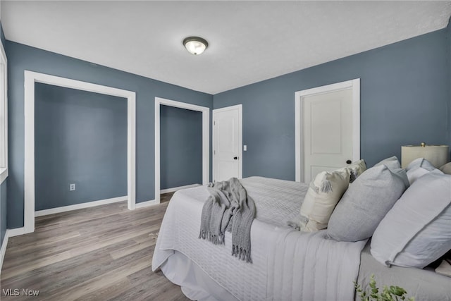 225 E Bergey St, Wadsworth, OH 44281 - bedroom featuring wood finished floors and baseboards