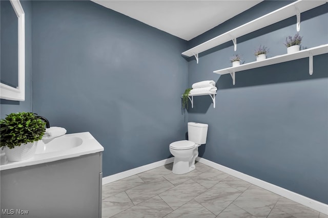 225 E Bergey St, Wadsworth, OH 44281 - half bath featuring marble look tiles and vanity