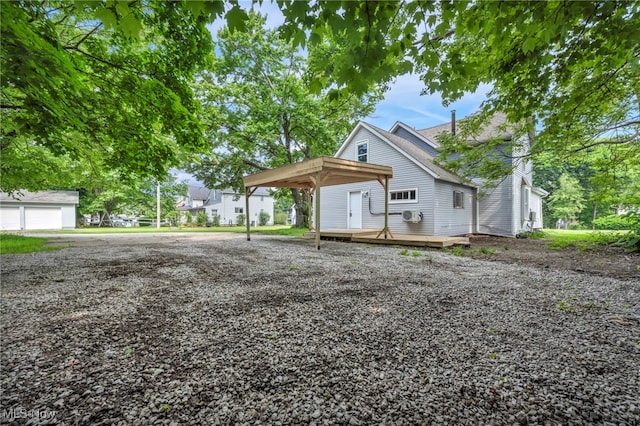 225 E Bergey St, Wadsworth, OH 44281 - view of property exterior with a deck and a carport
