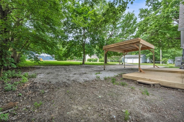 225 E Bergey St, Wadsworth, OH 44281 - view of yard featuring an outdoor structure and a deck