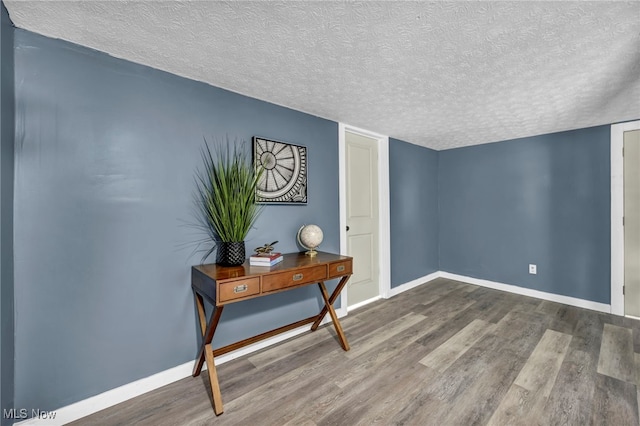 225 E Bergey St, Wadsworth, OH 44281 - interior space featuring wood finished floors and a textured ceiling
