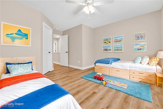 1255 E 351st St, Eastlake, OH 44095 - bedroom with wood finished floors, baseboards, and ceiling fan