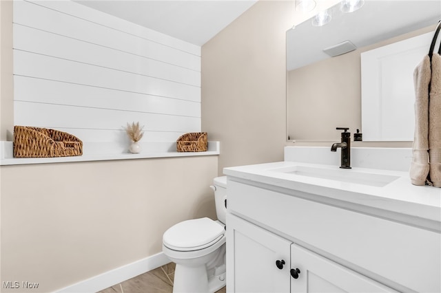 1255 E 351st St, Eastlake, OH 44095 - bathroom with vanity, toilet, and baseboards