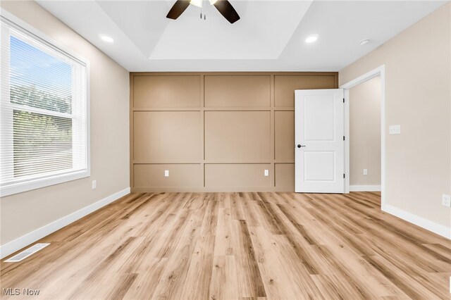 1255 E 351st St, Eastlake, OH 44095 - unfurnished bedroom with light wood finished floors, baseboards, ceiling fan, and recessed lighting