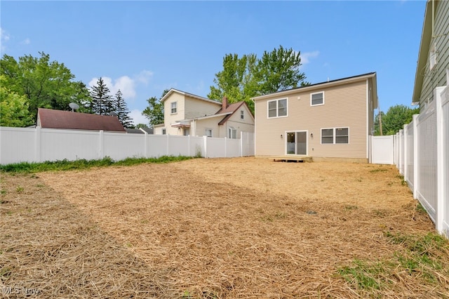 1255 E 351st St, Eastlake, OH 44095 - rear view of house with a fenced backyard