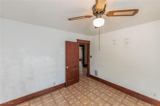 1222 W 6th St, Lorain, OH 44052 - unfurnished room with baseboards, ceiling fan, and light floors