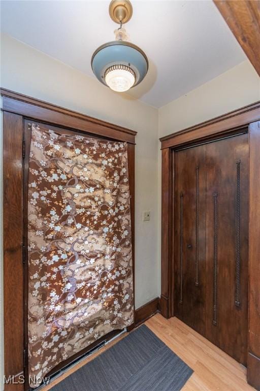 1222 W 6th St, Lorain, OH 44052 - foyer entrance with light wood-type flooring and baseboards