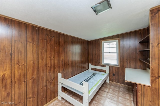 1222 W 6th St, Lorain, OH 44052 - bedroom with wooden walls, light flooring, a relaxing sauna, and baseboards