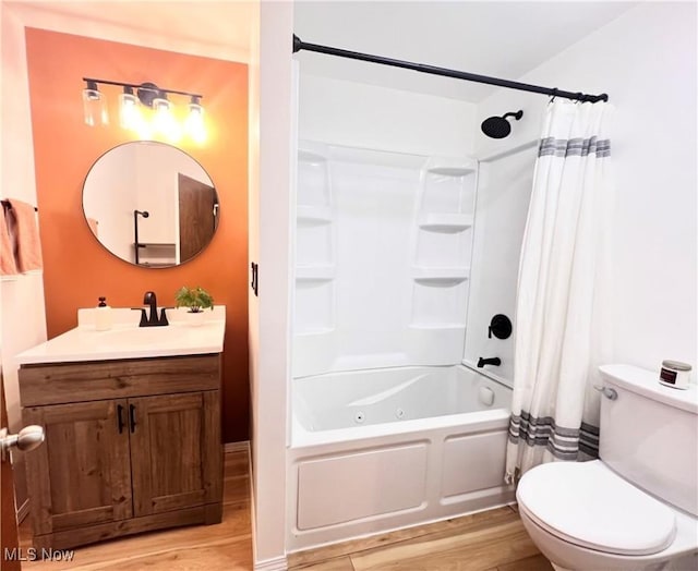 3221 Greenfield St NW, Warren, OH 44485 - full bathroom with wood finished floors, vanity, and shower / tub combo