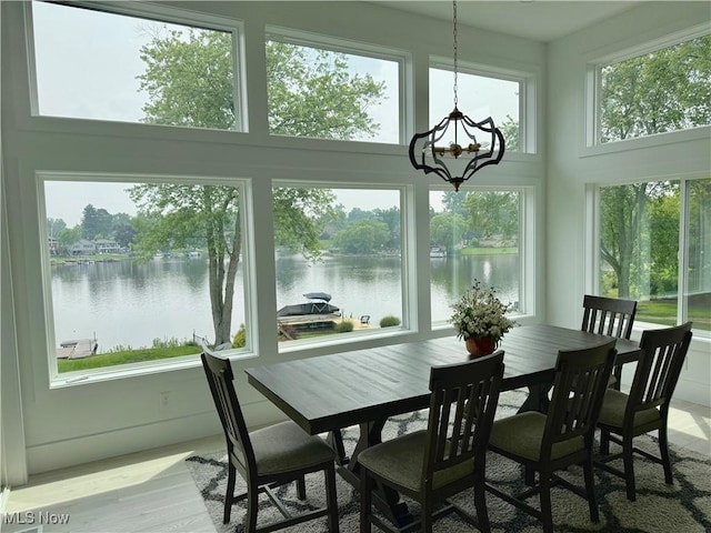 5771 E Blvd NW, Canton, OH 44718 - sunroom / solarium featuring a water view and a chandelier