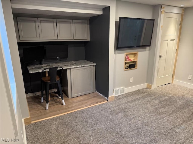 5771 E Blvd NW, Canton, OH 44718 - office space featuring built in desk, light colored carpet, and light wood-style floors