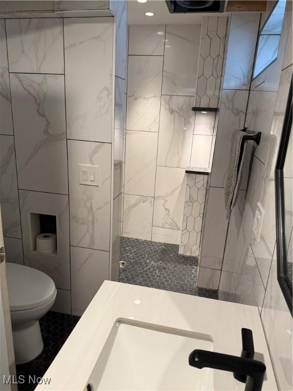 5771 E Blvd NW, Canton, OH 44718 - full bathroom featuring tile walls and tiled shower