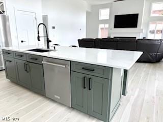 5771 E Blvd NW, Canton, OH 44718 - kitchen with dishwasher, light wood finished floors, open floor plan, and light countertops