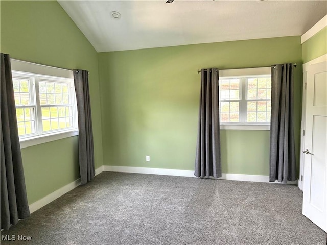 5771 E Blvd NW, Canton, OH 44718 - carpeted spare room with vaulted ceiling and baseboards