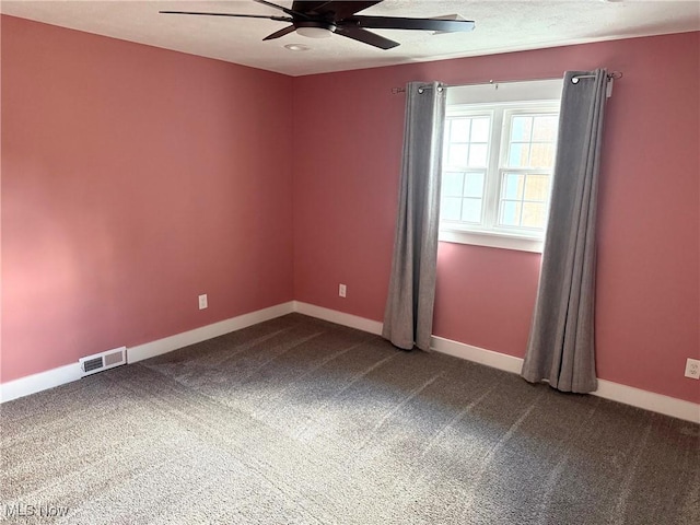 5771 E Blvd NW, Canton, OH 44718 - empty room featuring a ceiling fan and dark carpet