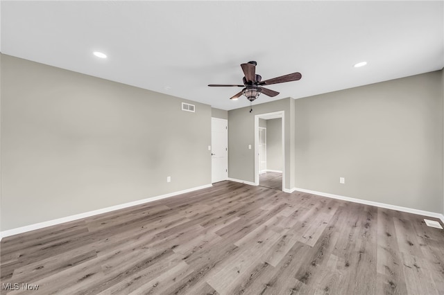 4371 Pine Lake Dr, Medina, OH 44256 - spare room featuring a ceiling fan, wood finished floors, baseboards, and recessed lighting