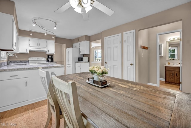 3895 Mars Dr, Brunswick, OH 44212 - dining room featuring a ceiling fan and light wood-type flooring